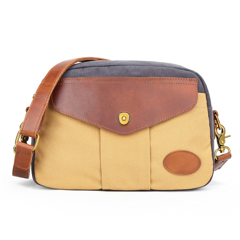 Khaki canvas satchel with contrasting strap details